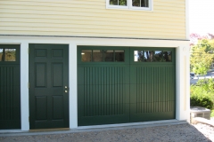 One Dark Green Garage Door